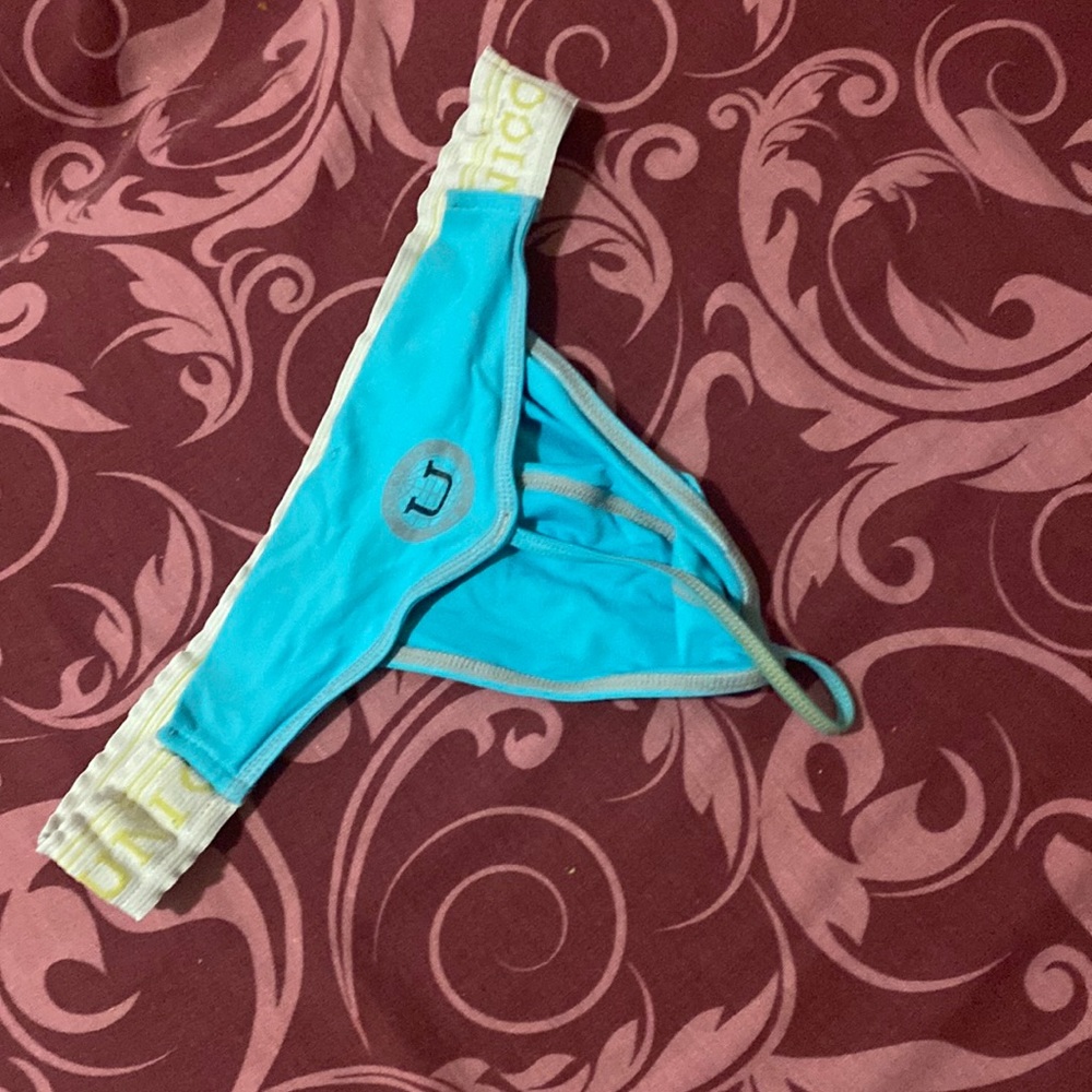 Unico thong used large
